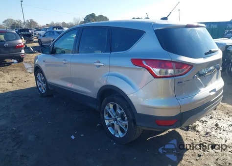 2013 Ford Escape Sel z USA, uszkodzony, nr VIN 1FMCU0H93DUA79422